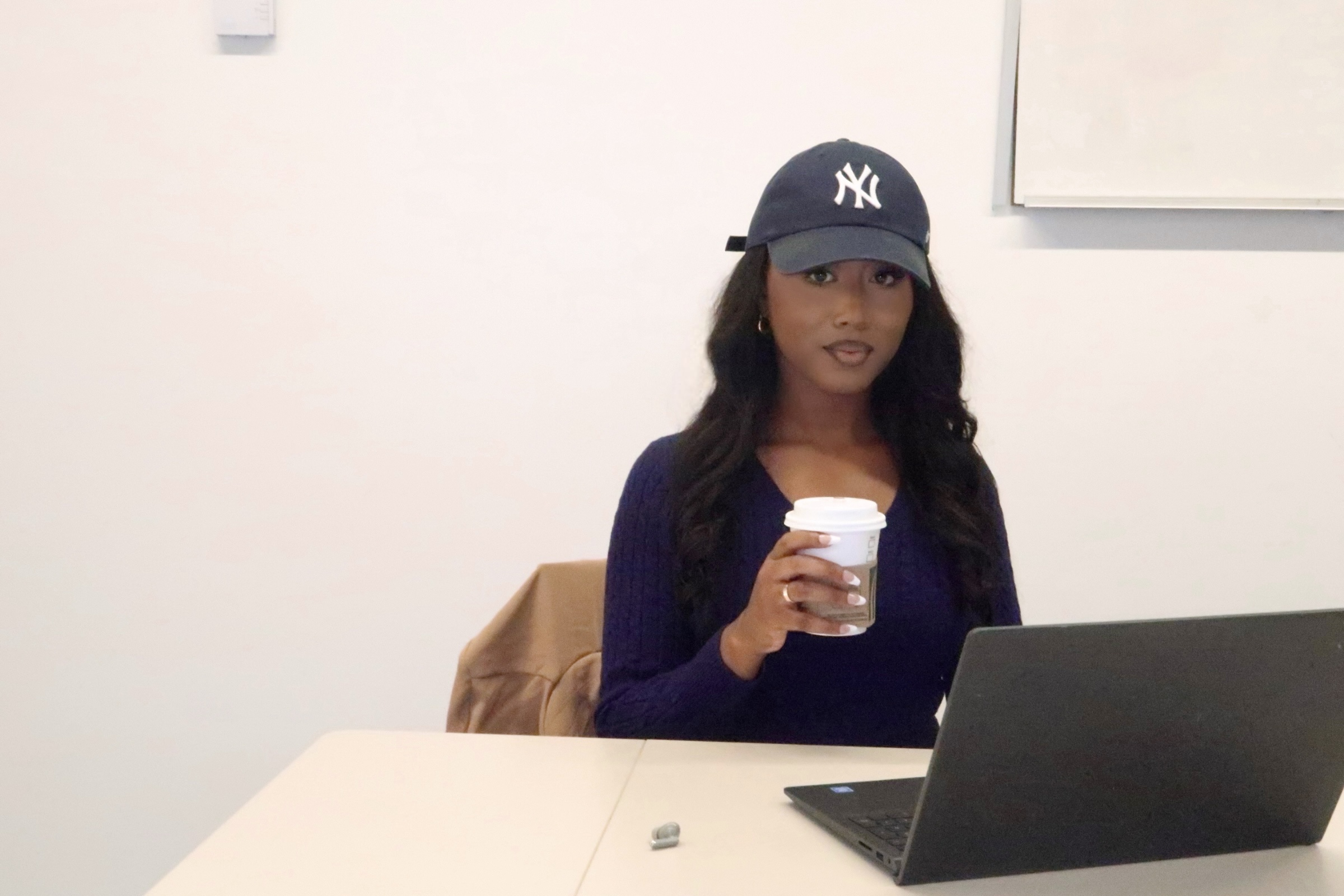 The Woman in the Classic Navy Blue Yankees Hat